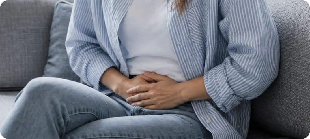 Woman experiencing UTI discomfort