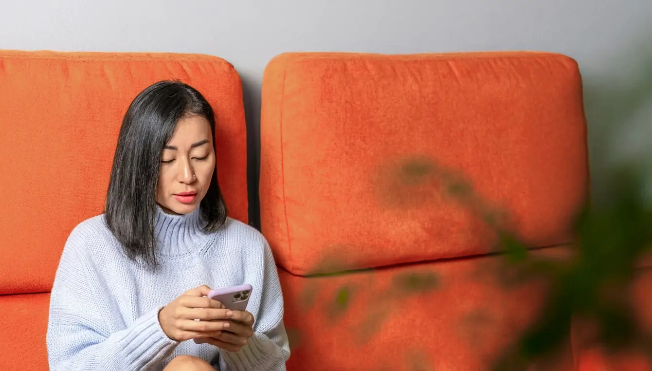 Person reviewing validated test results securely on a phone